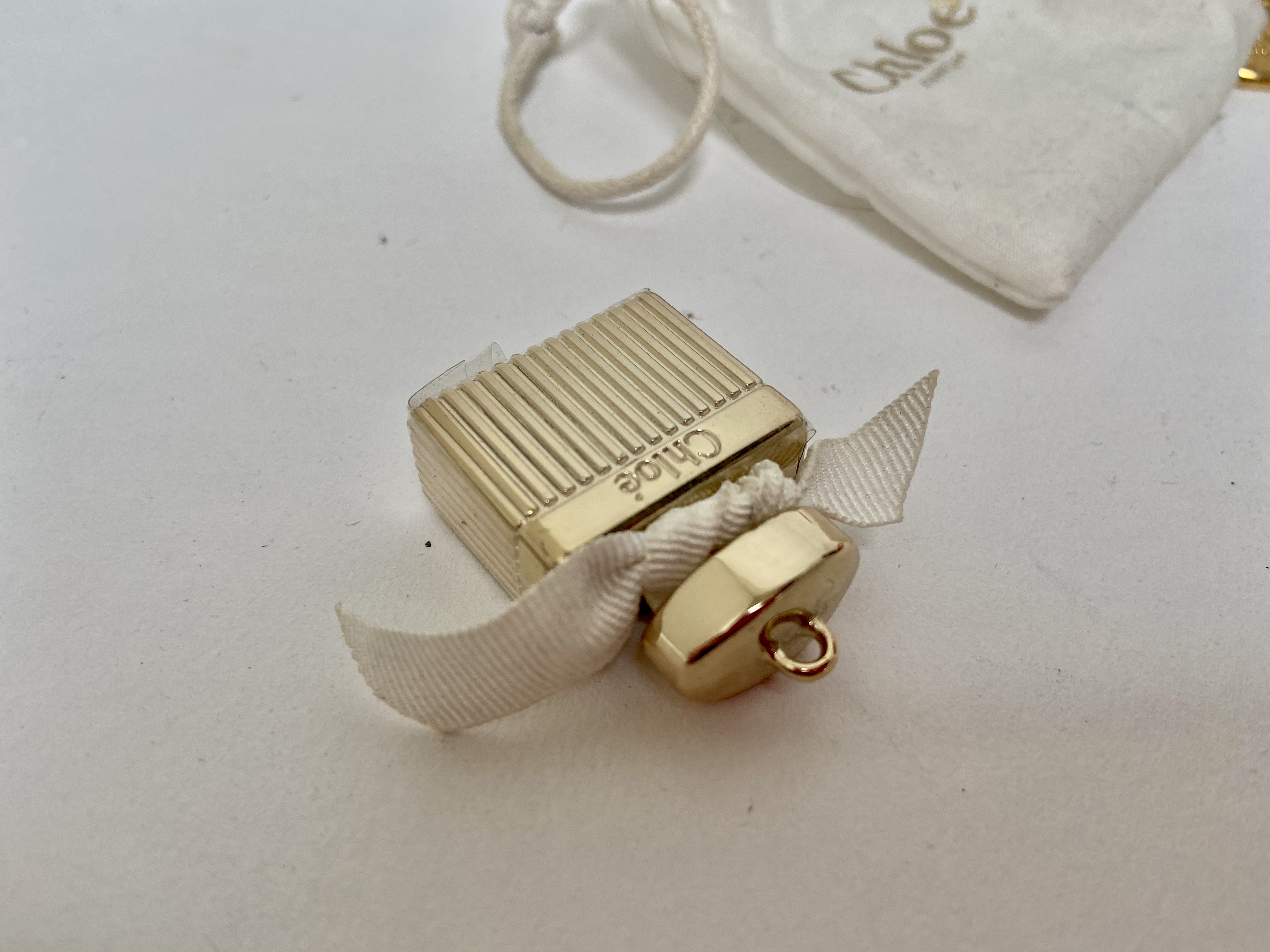 Miniature Chloé perfume bottle pendant